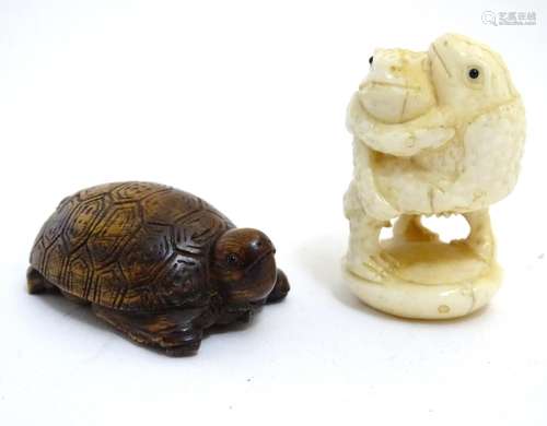 Two 20thC netsuke comprising a double sided example depicting a tortoise to one side and a bearded