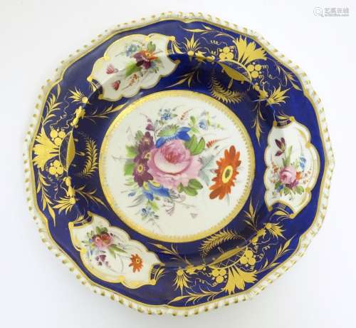 A Bloor Derby soup dish / plate with a cobalt ground and gilt highlights, the central section and