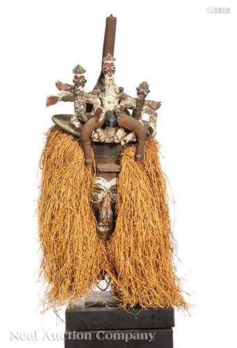 African Carved Wood, Hide and Straw Figural Mask