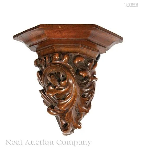 Pair of American Carved Walnut Corner Brackets