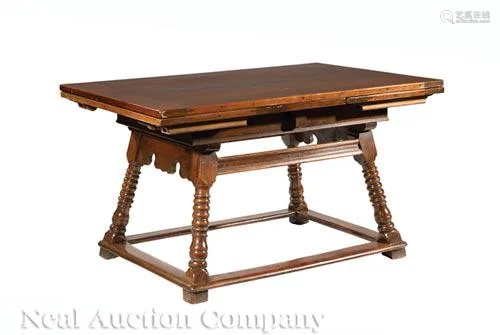 Carved Mahogany and Oak Draw-Leaf Table