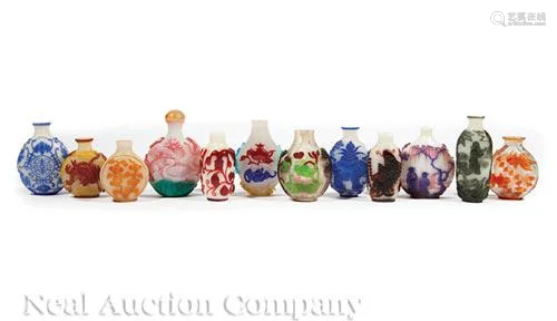 Twelve Chinese Color Overlay Glass Snuff Bottles