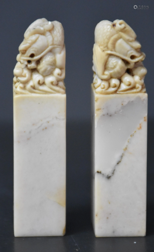 Pair of Chinese seals in hard stone with carved dragon