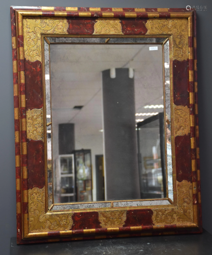 Italian mirror in patinated wood and glazing beads in