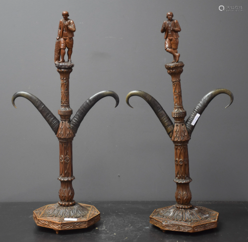 Pair of carved wooden hooks from the black forest