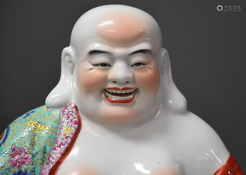 Laughing porcelain Buddha. Ht 28 cm.