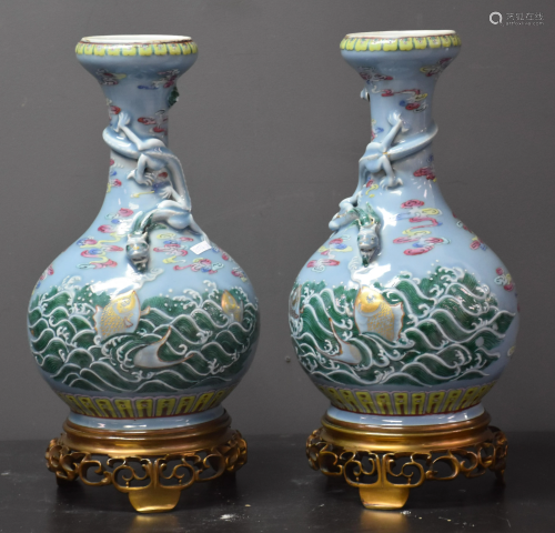 Pair of Chinese porcelain vases decorated with dragons