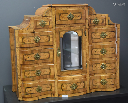 Small cabinet to pose in marquetry. Germany 18th