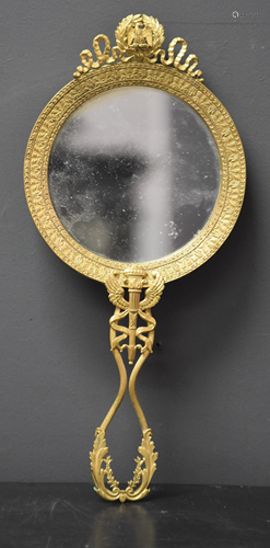 Empire style gilt bronze hand mirror. Ht 25 cm.