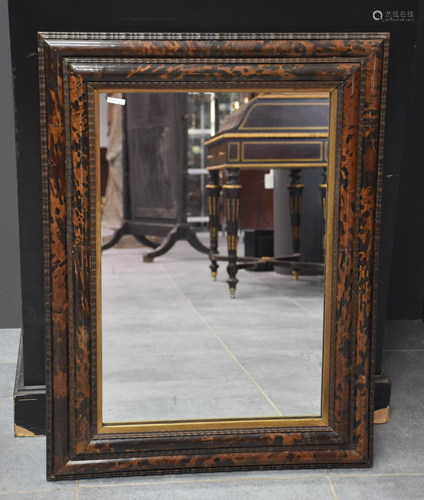 Mirror circa 1920 in tortoise shell veneer. 82 x 60 cm.