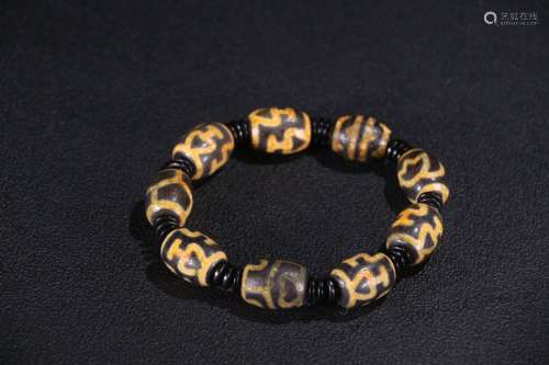 A Chinese Bracelet With Dzi