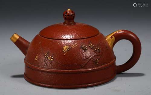 A Chinese Zisha Teapot With Golden Painting