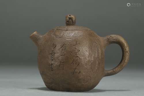 A Chinese Zisha Teapot With Potery Pattern