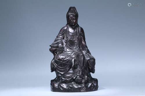 A Chinese Rosewood Guanyin Buddha Ornament