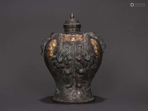 A Chinese Silver Vase With Fish Carving And Gilding