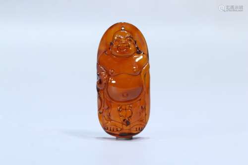 A Chinese Amber Maitreya Carved Ornament