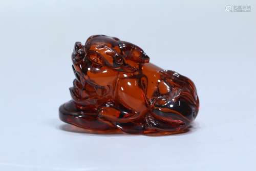 A Chinese Amber Beast Carved Ornament