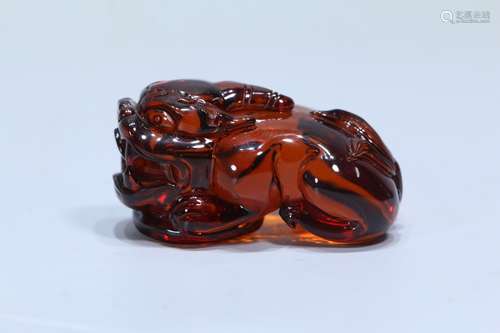 A Chinese Amber Beast Carved Ornament