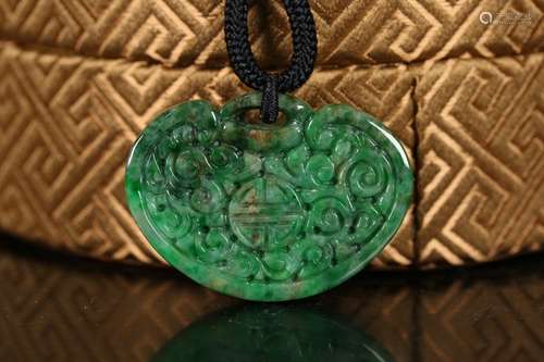 A Chinese Jadeite Auspicious Carved Pendant