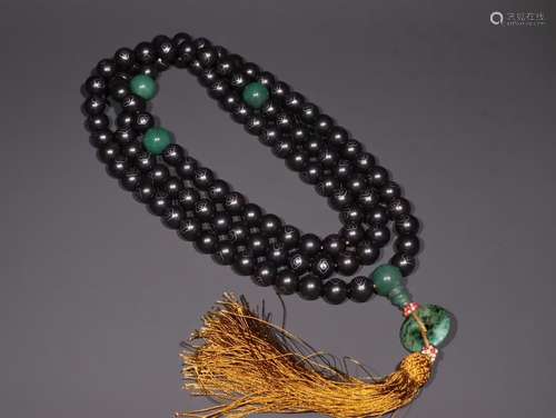 A Chinese Agarwood Rosary Necklace With Cloud Pattern