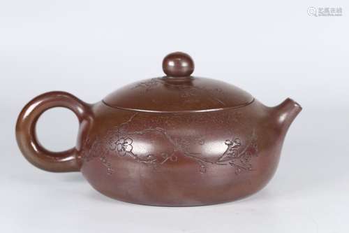 A Chinese Zisha Teapot With Potery Pattern