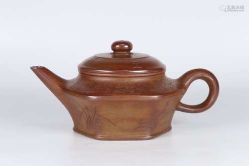 A Chinese Zisha Teapot With Potery Pattern