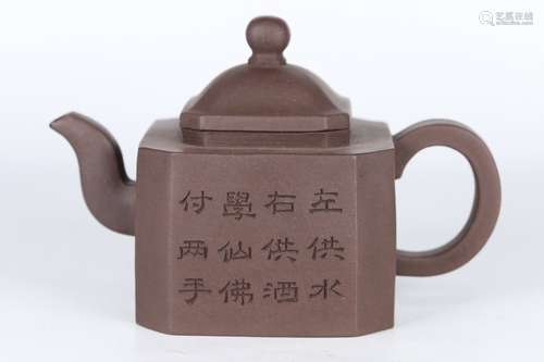 A Chinese Zisha Teapot With Potery Pattern