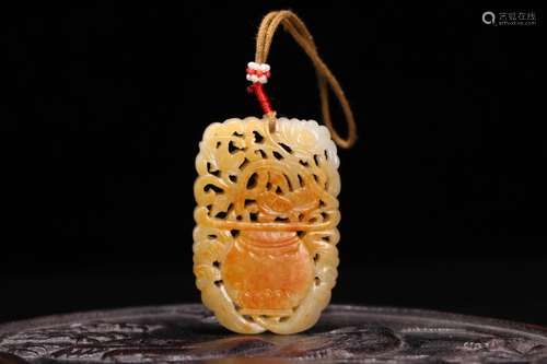 A Chinese Hetian Jade Pendant With Carvings