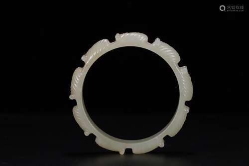 A Chinese Hetian Jade Bangle With Carvings