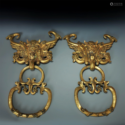 ANCIENT CHINESE,A PAIR OF GILT-BRONZE KNOCKER