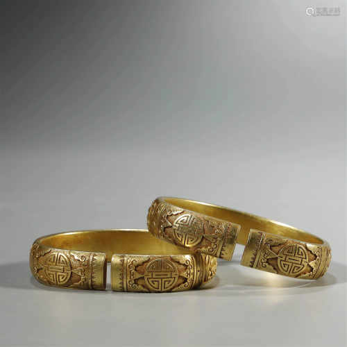 ANCIENT CHINESE,A PAIR OF GILT-SILVER BRACELETS