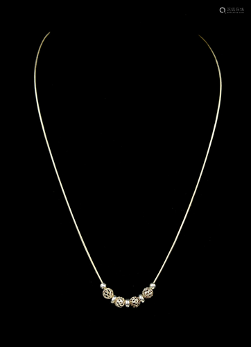 A Silver Necklace with Silver Beads