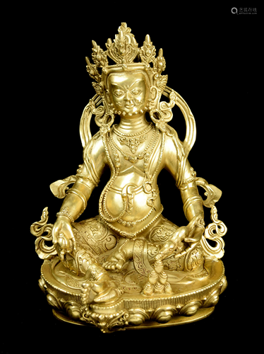 [Chinese] A Tibetan Brass Yellow Jambhala (Go…