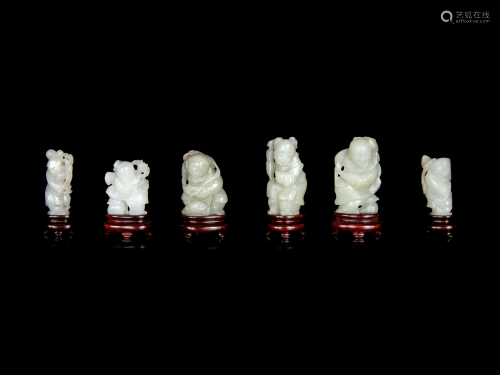 Six Chinese Carved Celadon Jade Figures of B…