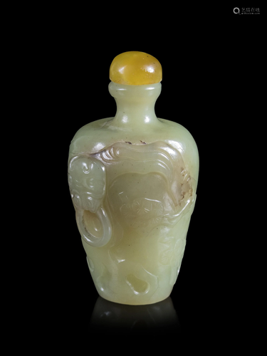 A Carved Yellow Jade 'Crane and Pine' Snu…