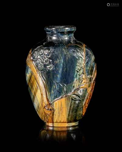 A Carved Tiger’s Eye Snuff Bottle