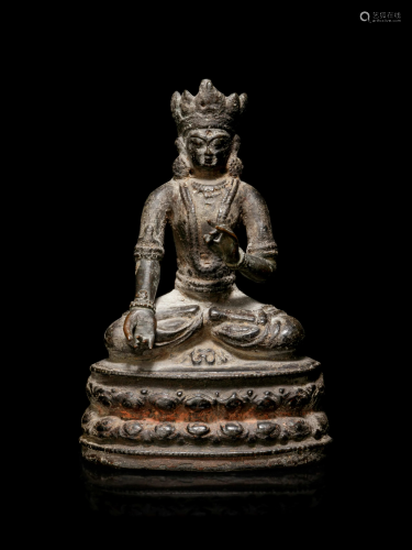 A Sino-Tibetan Bronze Figure of a Seated…