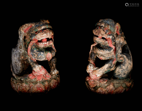 A Pair of Chinese Polychrome Painted Wood …