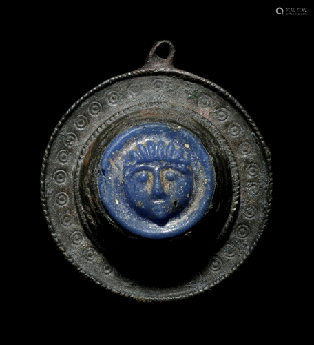 A Romano-Celtic Bronze and Blue Glass Fib…