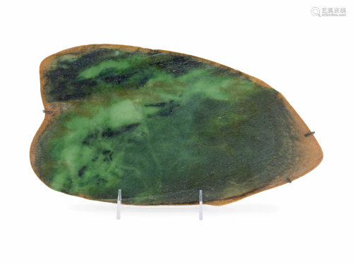 A Large Chinese Mottled Green Jade Plaque