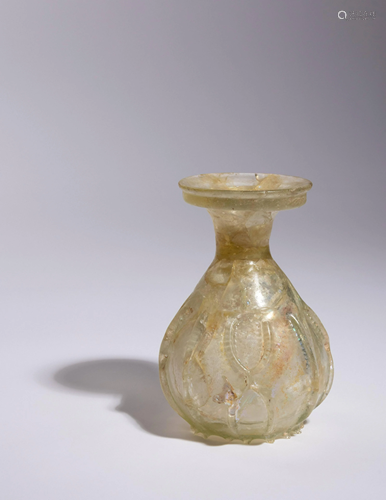 A Roman Glass Flask Height 5 3/8 inches.