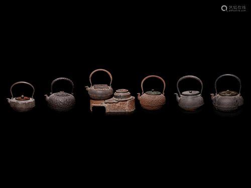 Seven Japanese Cast Iron Teapots, Tetsubin, and…