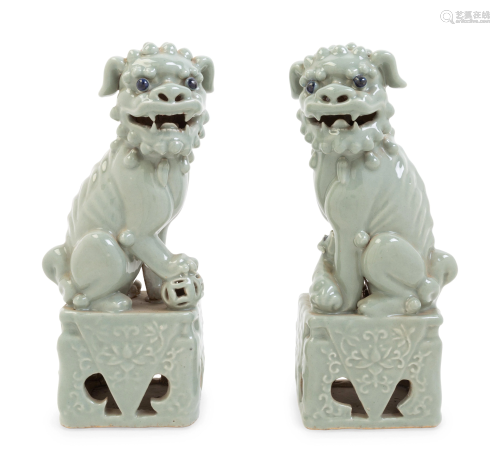 A Pair of Chinese Blue Glazed Porcelain Figu…
