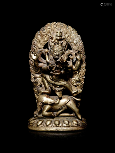 A Tibetan Gilt Bronze Figure of Mahakala and …