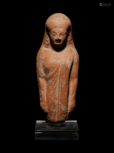 A Greek Terracotta Kore Height 5 7/8 inches.