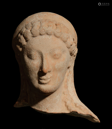 A Greek Terracotta Head Height 4 inches.