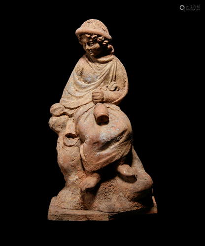 A Greek Terracotta Seated Scholar Holding a …