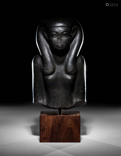 An Egyptian Basalt Portrait Bust of a Woman …