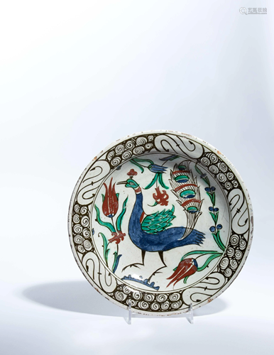 An Iznik Pottery Dish Diameter 10 1/2 inches.