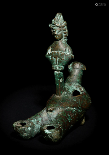 A Roman Bronze Oil Lamp in the Shape of …